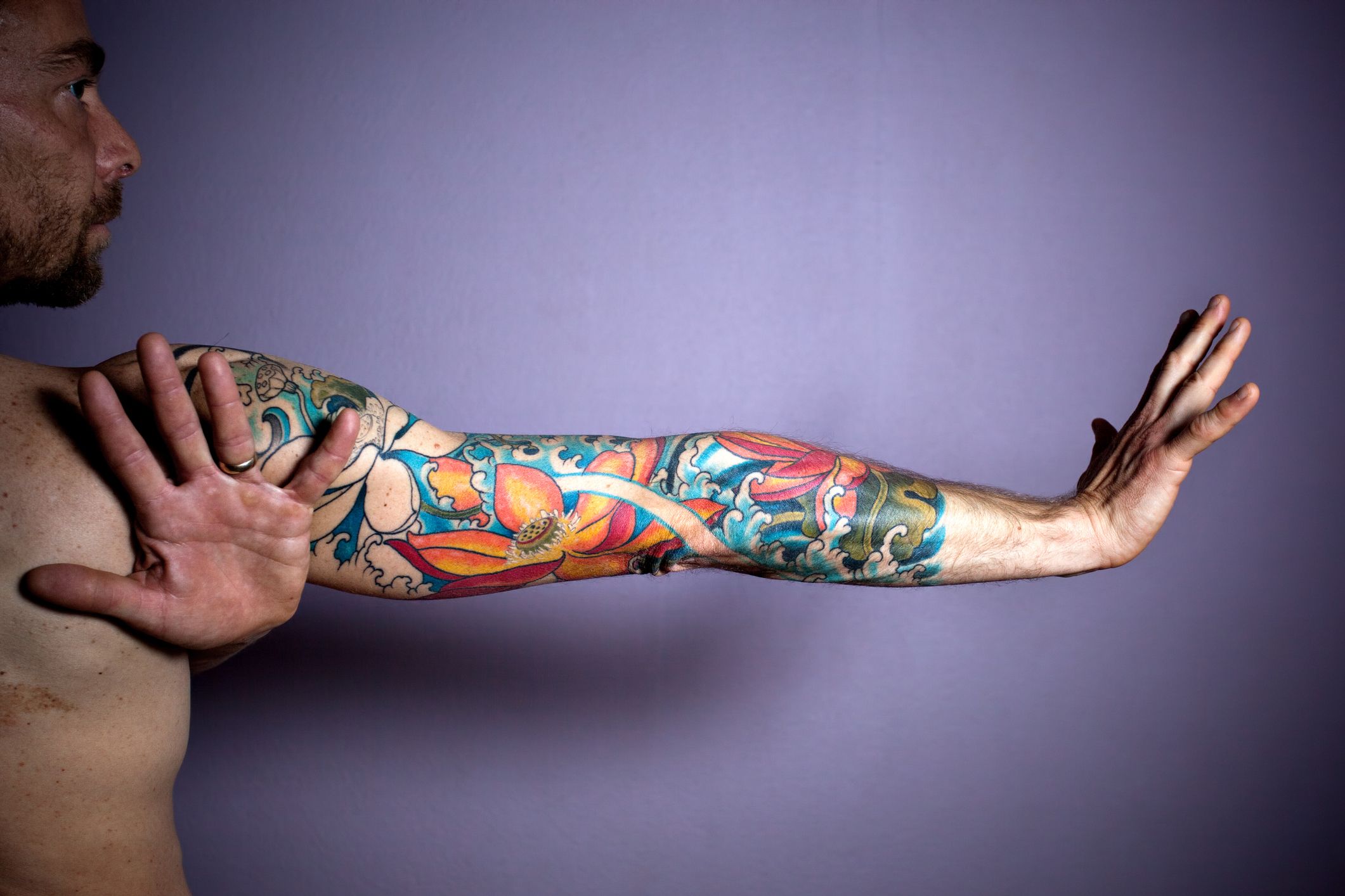 3 Men Shared the Epic Tattoos They Got to Cover Their Scars